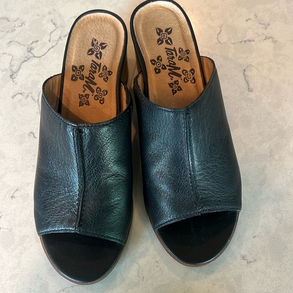 Tara M slides in black leather. Size 8. Excellent condition. Padded foot bed.